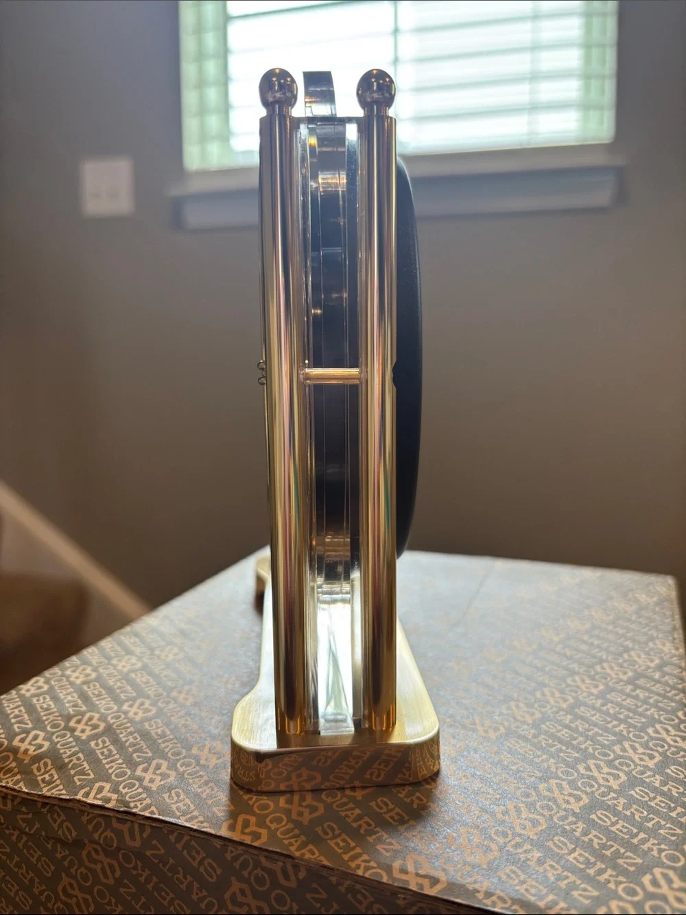 This is a vintage Seiko Quartz desk mantle clock